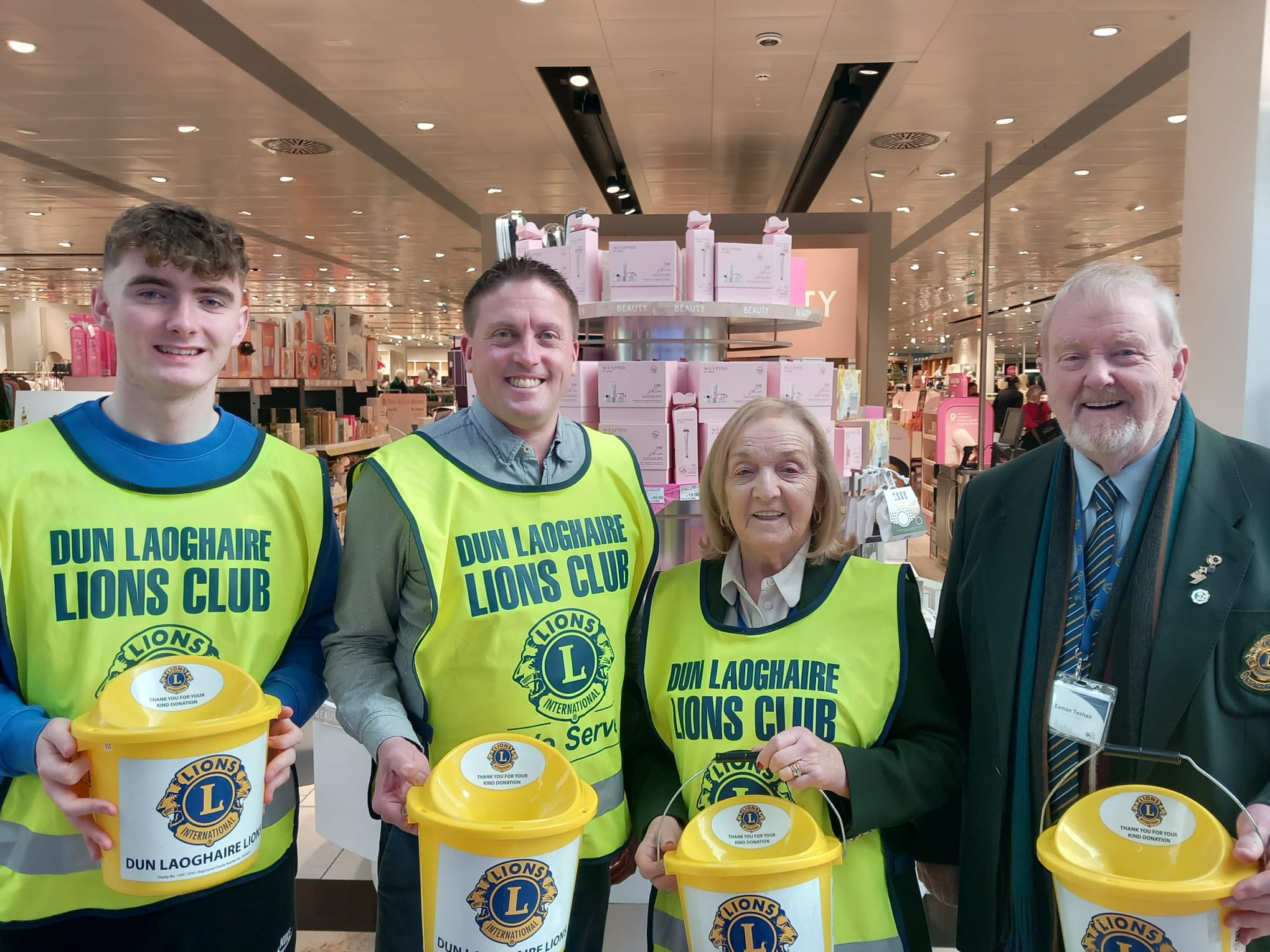 Local charity volunteers distributing gifts during Christmas Food Appeal